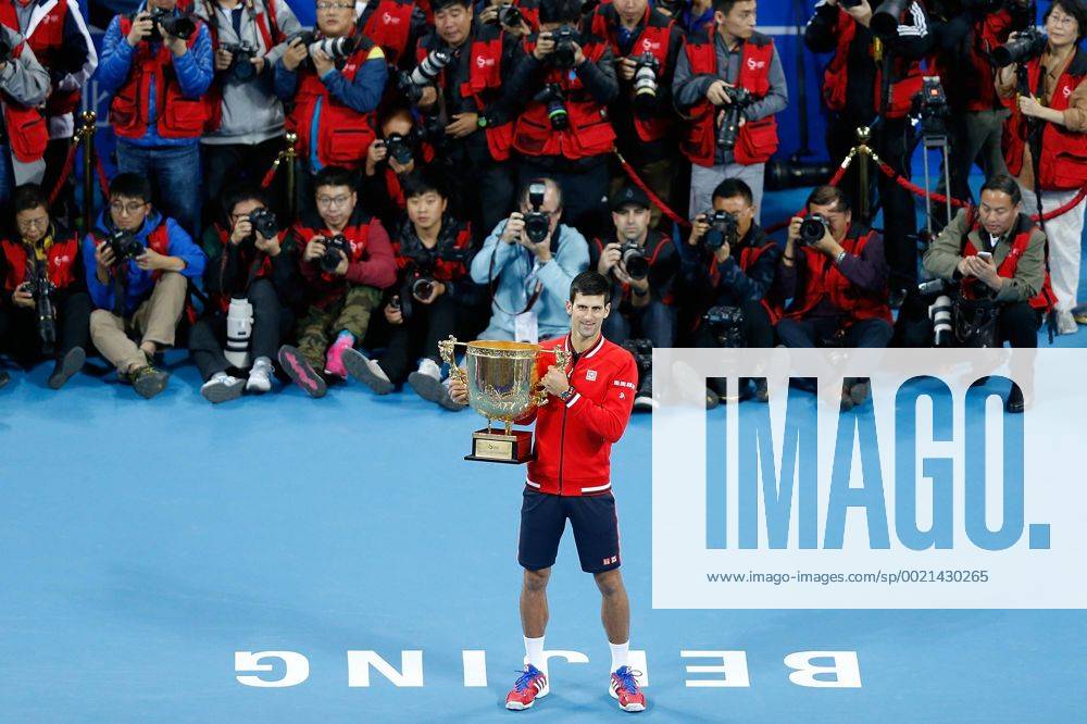 (151011) -- BEIJING, Oct. 11, 2015 -- Novak Djokovic of Serbia poses with his champion trophy during the awarding ceremony for the men s singles final at 2015 China Open Tennis Tournament in Beijing, China, Oct. 11, 2015. Djokovic claimed the title of the event after beating Rafael Nadal of Spain 2-0. ) (SP)CHINA-BEIJING-TENNIS-CHINA OPEN-MEN S SINGLES-FINAL WangxLili