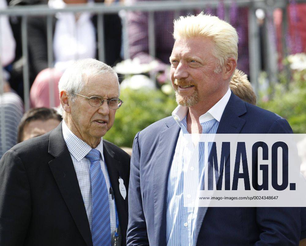 Queens Club, London, England. Aegon Queens Tennis Championships Day Five. The tournament celebrated its four time champions on Centre Court this afternoon with presentations of quarter sized trophies to four-time champions Boris Becker, John McEnroe, Roy Emerson and Lleyton Hewitt. Pictured are Roy Emerson and Boris Becker. Martinx ActionPlus11750659
