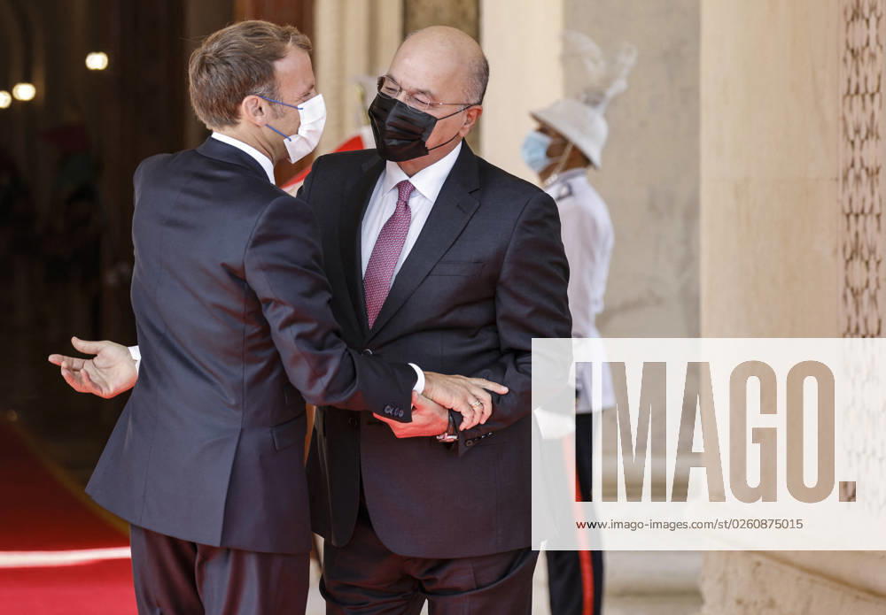 French President Emmanuel Macron in Baghdad - Iraq Iraqi President Barham Saleh (R) welcomes his French countepart Emmanuel Macron in Baghdad on August 28, 2021. - Macron is among leaders set to attend a regional summit today in Iraq, with the Taliban s takeover of Afghanistan and a deadly jihadist attack in Kabul overshadowing the meeting. Photo by Ludovic Marin pool ABACAPRESS;COM Baghdad Iraq