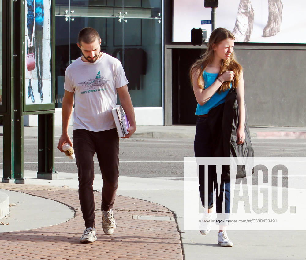 EXCLUSIVE Actor Shia LaBeouf grabs some coffee for his Nymphomaniac co-star girlfriend Mia Goth as they spend the day together 88583, LOS ANGELES, CALIFORNIA - Friday December 21, 2012. EXCLUSIVE Actor Shia LaBeouf grabs some coffee for his Nymphomaniac co-star girlfriend Mia Goth before taking her for some shopping at Marc Jacobs on Melrose Ave in West Hollywood. The pair are controversially slated to perform un-simulated sex on camera for the Lars von Trier film. , Credit:Vanessa Pacheco , PacificCoastNews.com Avalon USA, Los Angeles