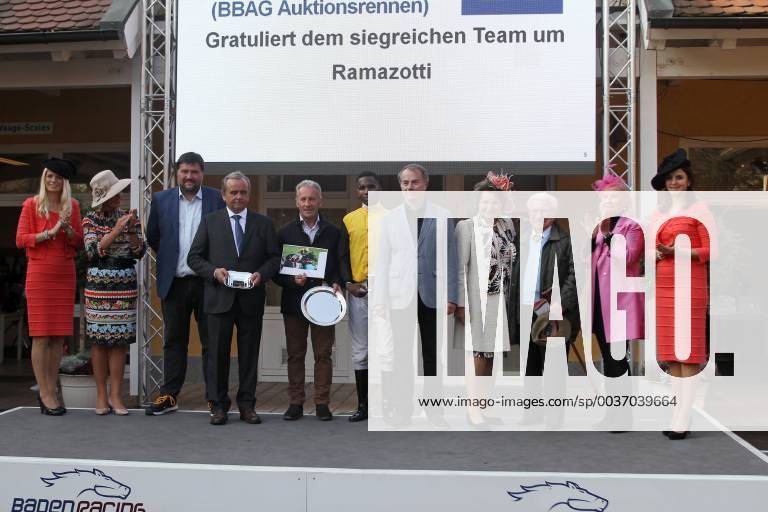 Iffezheim Baden Wuerttemberg GER Award Ceremony Ramazotti wins the Ferdinand Leisten Memorial with Eduardo Pedroza Memorial Baden Baden Iffezheim Award Ceremony Ramazotti Pedroza Victory 181019B556IFFEZHEIM JPG