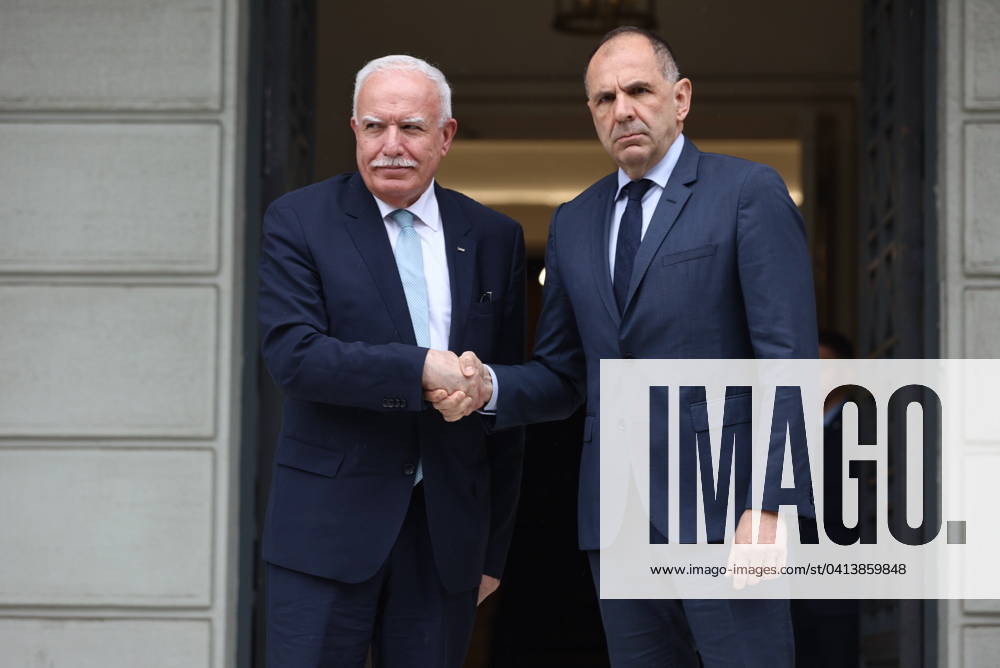 Greek Foreign Minister Giorgos Gerapetritis (R) welcomes the Palestinian Authoritys Foreign Minister Riyad al-Maliki (L) during their meeting in Athens, Greece, 15 February 2024. The Palestinian Authoritys foreign minister is in Athens on a working visit. IMAGO ONE INCH PRODUCTIONS ATHENS Greece