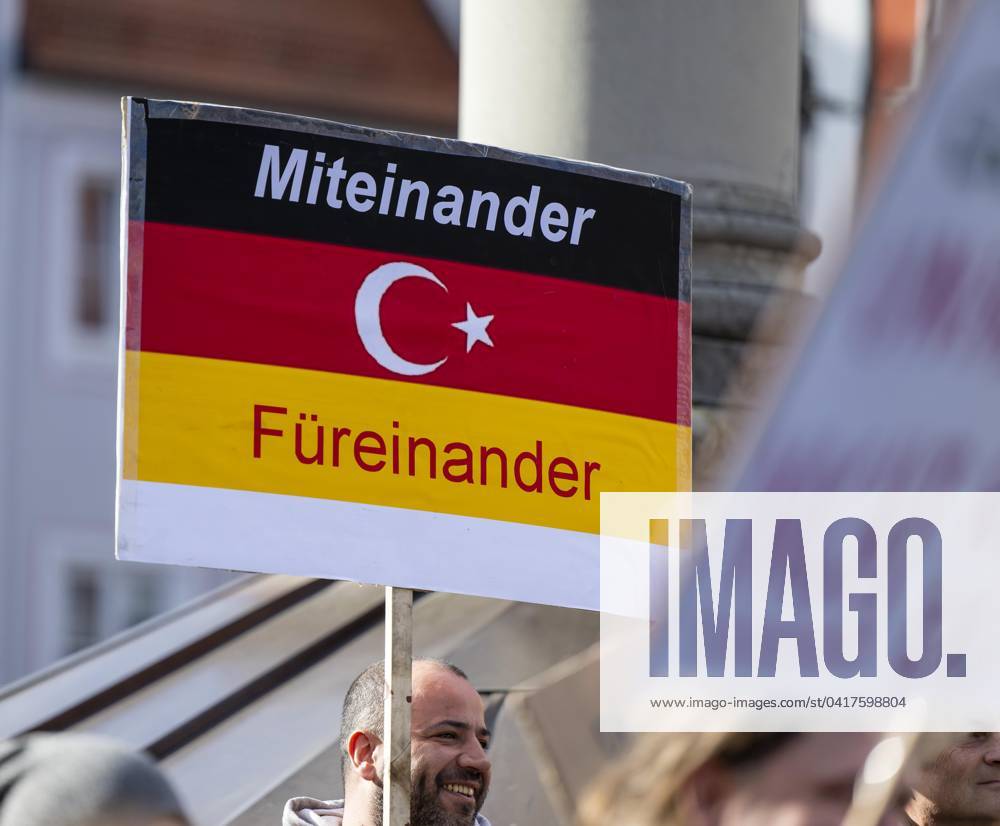 Demonstration in Mindelheim in Unterallgäu ÒMindelheim sticks togetherÓ, for democracy and humanity, against right-wing extremism The people of Mindelheim gather at Marienplatz to demonstrate against the shift to the right in politics Poster MITEINANDER FÜREINANDER 25 02 2024, Demonstration in Mindelheim 25 02 2024, Demonstration in Mindelheim