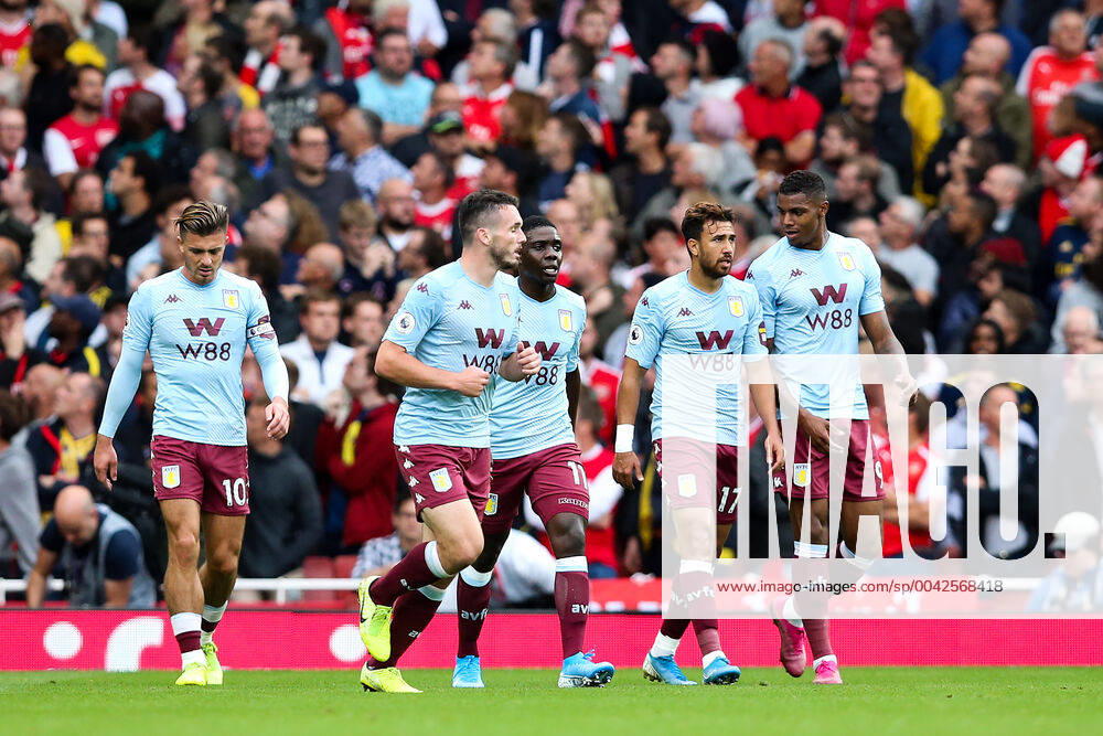John McGinn of Aston Villa celebrates scoring the first goal of the game during the Premier League match at the Emirates Stadium, London. Picture date: 22nd September 2019. Picture credit should read: James Wilson Sportimage . SPI-0217-0014