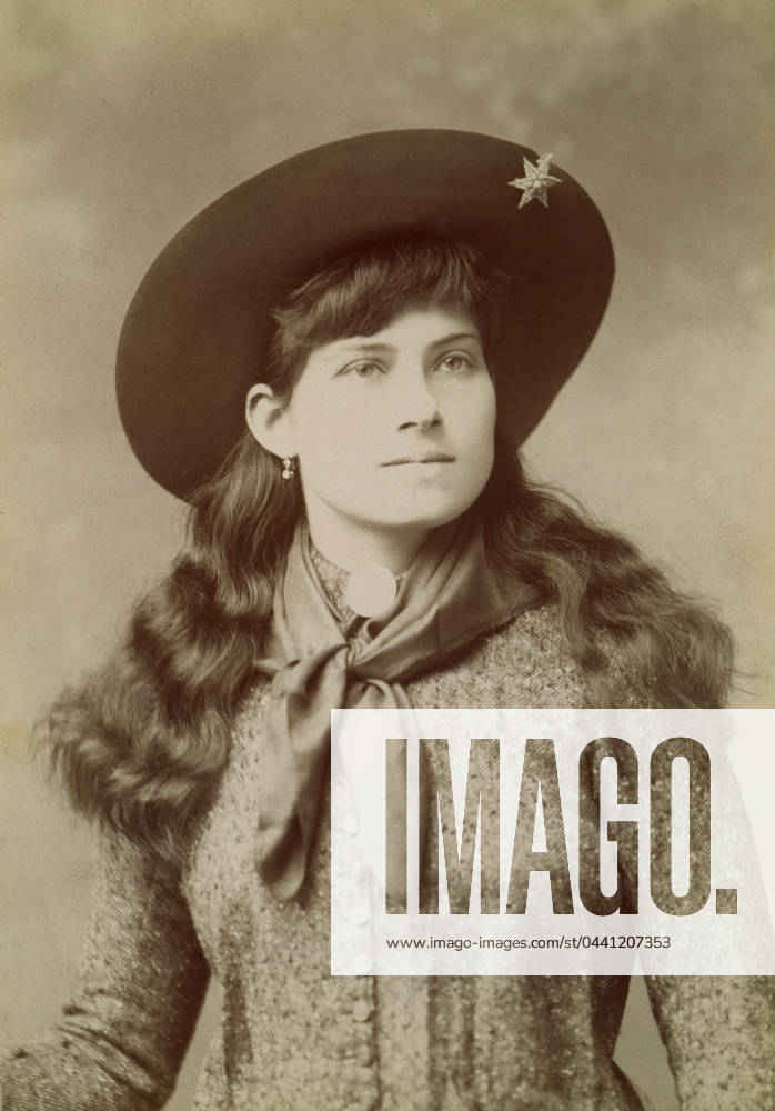 ANNIE OAKLEY (1860-1926). American markswoman: photograph, c1890.