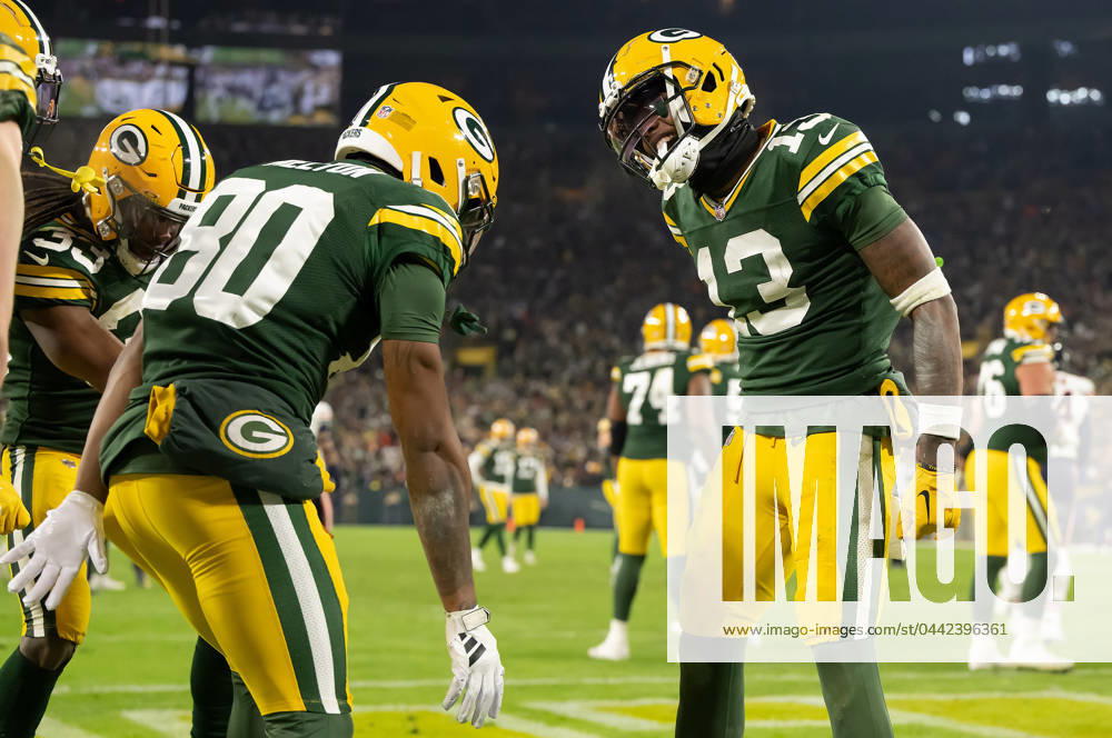 NFL 2024: Bears vs Packers JAN 07 January 7, 2024: Green Bay Packers wide receiver Bo Melton (80) and Green Bay Packers wide receiver Dontayvion Wicks (13) celebrate a touchdown against the Chicago Bears in Green Bay, WI. Kirsten Schmitt Cal Sport Media., Credit:Kirsten Schmitt Avalon United States of America, Wisconsin, Green Bay, Lambeau Field