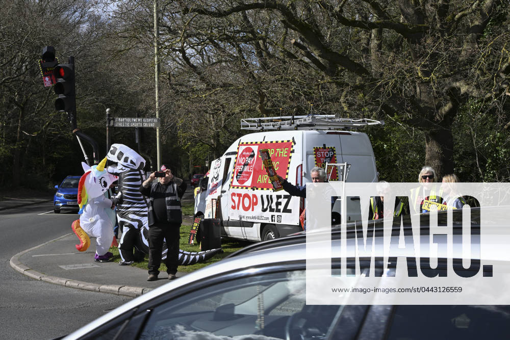 Protesters during a protest against the Ultra Low Emission Zone at the Chislehurst War Memorial in Chislehurst, London. ULEZ cameras in Chislehurst and other nearby areas have been vandalised in previous months.