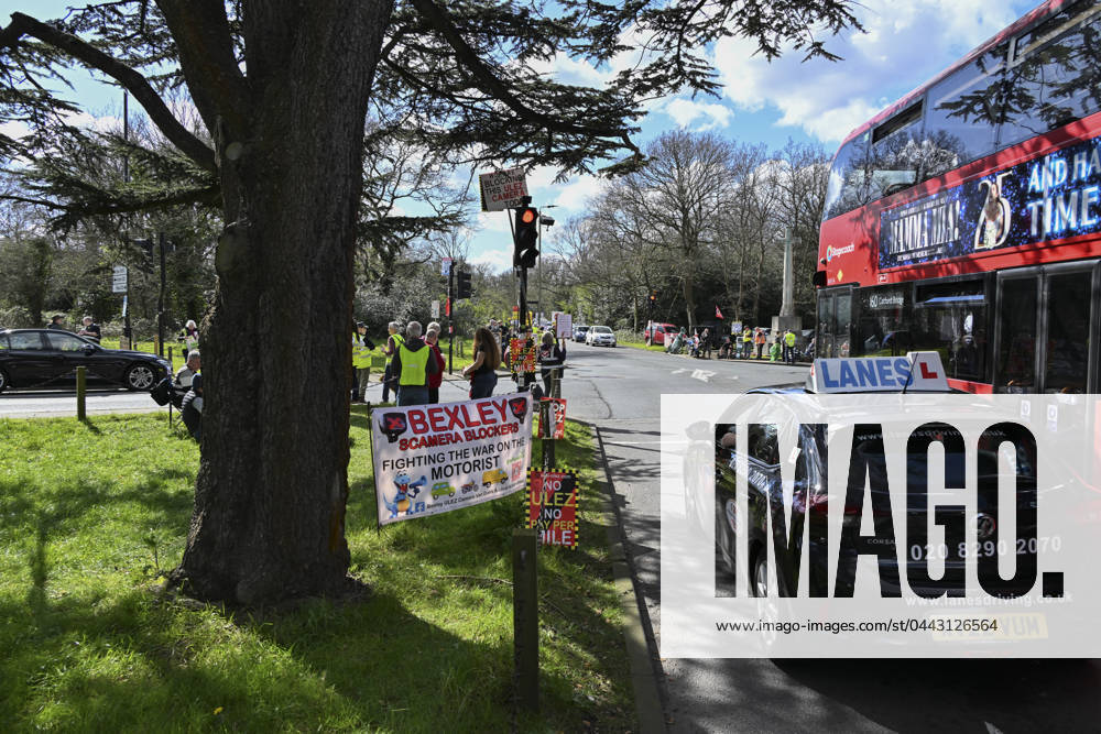 Protesters during a protest against the Ultra Low Emission Zone at the Chislehurst War Memorial in Chislehurst, London. ULEZ cameras in Chislehurst and other nearby areas have been vandalised in previous months.