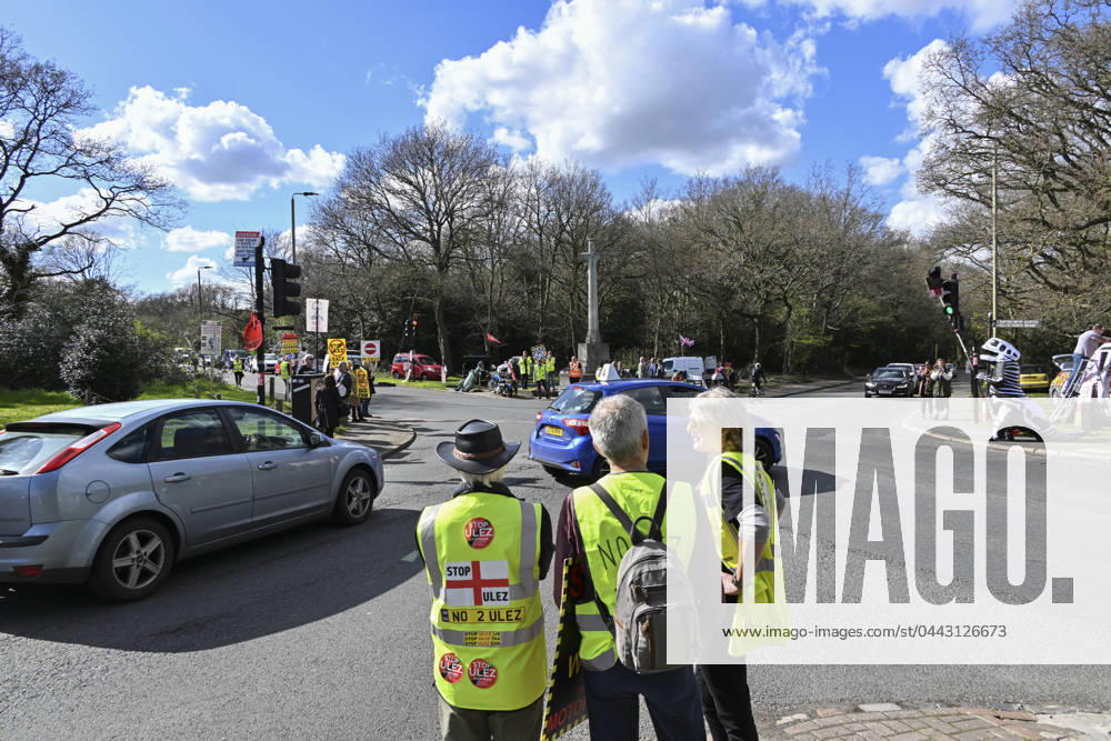 Protesters during a protest against the Ultra Low Emission Zone at the Chislehurst War Memorial in Chislehurst, London. ULEZ cameras in Chislehurst and other nearby areas have been vandalised in previous months.