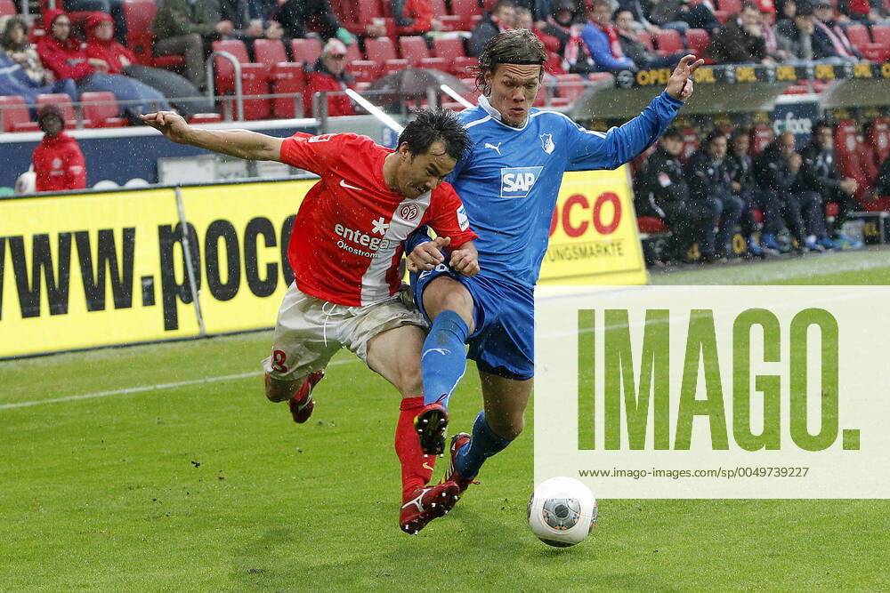 Mainz, Germany 05 October 2013 1 Bundesliga 13 14 8 Spieltag 1 FSV Mainz 05 vs 1899 Hoffenheim v li Shinji Okazaki Mainz in a running duel against Jannik Vestergaard Hoffenheim , t.s., landscape 1 Bundesliga 13 14 8 Spieltag 1 FSV Mainz 05 vs 1899 Hoffenheim jr