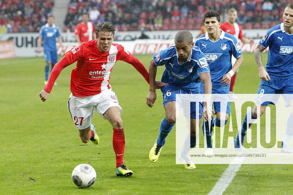 Mainz, Germany 05 October 2013 1 Bundesliga 13 14 8 Matchday 1 FSV Mainz 05 vs 1899 Hoffenheim v li Nicolai Müller Mainz in duel against Jeremy Toljan Hoffenheim , in background v li Nicolai Müller Mainz , Jeremy Toljan Hoffenheim , t.s., landscape 1 Bundesliga 13 14 8 Matchday 1 FSV Mainz 05 vs 1899 Hoffenheim jr