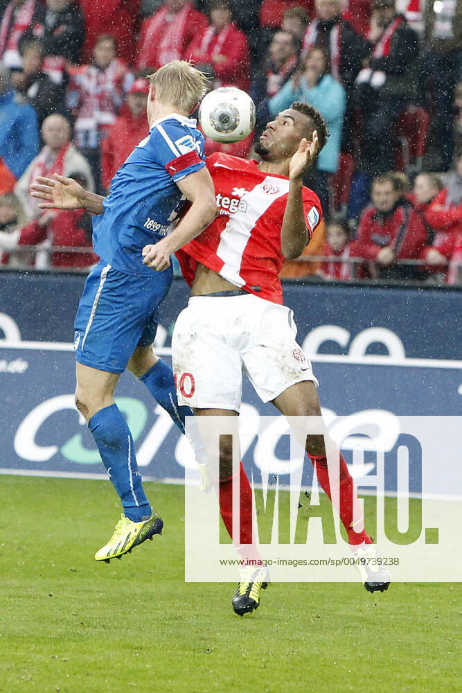 Mainz, Germany 05 October 2013 1 Bundesliga 13 14 8 Matchday 1 FSV Mainz 05 vs 1899 Hoffenheim v li Andreas Beck Hoffenheim in a header duel against Maxim Choupo Moting Mainz , tall, portrait 1 Bundesliga 13 14 8 Matchday 1 FSV Mainz 05 vs 1899 Hoffenheim jr