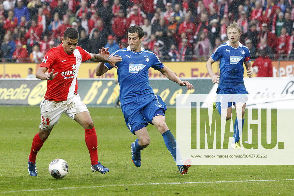 Mainz, Germany 05 October 2013 1 Bundesliga 13 14 8 Spieltag 1 FSV Mainz 05 vs 1899 Hoffenheim v li Shawn Parker Mainz one-on-one with David Abraham Hoffenheim , t.s., landscape 1 Bundesliga 13 14 8 Spieltag 1 FSV Mainz 05 vs 1899 Hoffenheim jr