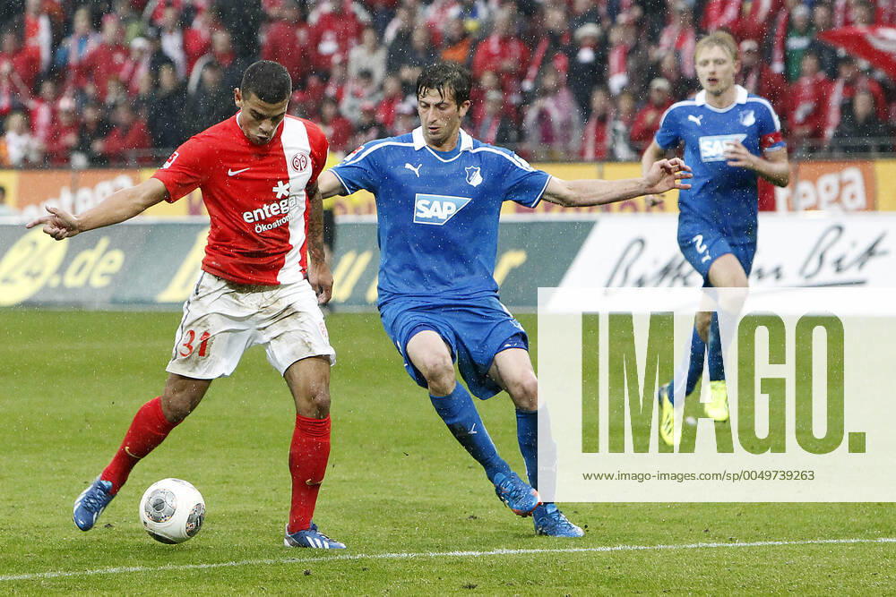 Mainz, Germany 05 October 2013 1 Bundesliga 13 14 8 Spieltag 1 FSV Mainz 05 vs 1899 Hoffenheim v li Shawn Parker Mainz one-on-one with David Abraham Hoffenheim , t.s., landscape 1 Bundesliga 13 14 8 Spieltag 1 FSV Mainz 05 vs 1899 Hoffenheim jr