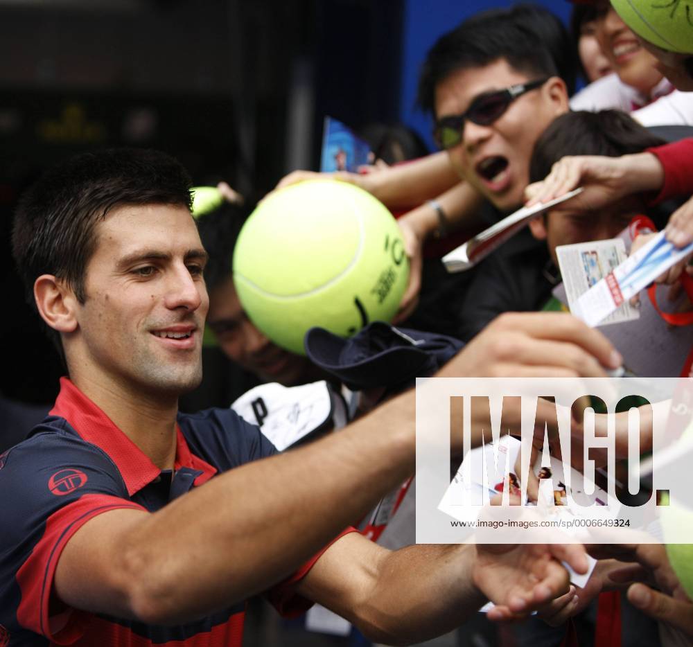 BEIJING, Oct. 9, 2010 - Novak Djokovic of Serbia signs autographs after the men s singles semifinal at the China Open tennis tournament in Beijing, capital of China