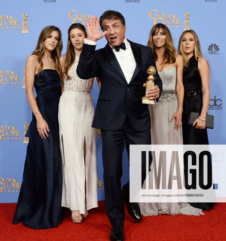 Actor Sylvester Stallone, winner of the award for Best Performance by an Actor in a Supporting Role in a Motion Picture for Creed appears with Jennifer Flavin, daughters Sistine, Scarlet and Sophia backstage with his wife Jennifer and their three daughters during the 73rd annual Golden Globe Awards at the Beverly Hilton Hotel in Beverly Hills, California on January 10, 2016. LAP20160110950 JIMxRUYMEN