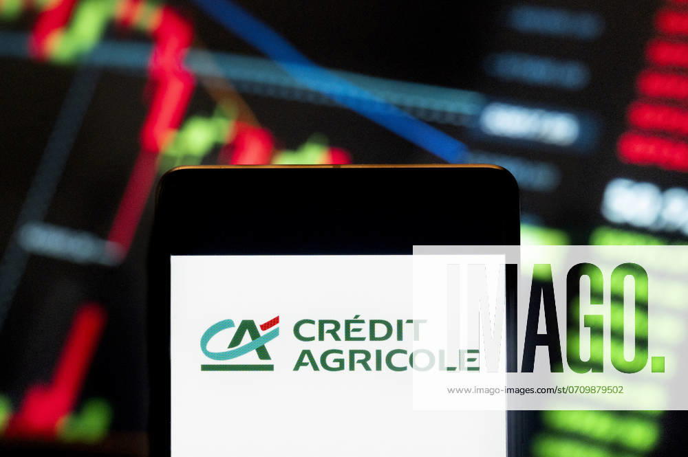 Logos displayed on smartphones in China - 21 Jun 2024 In this photo illustration, the French worlds largest cooperative financial institution Credit Agricole (EPA: ACA) logo seen displayed on a smartphone with an economic stock exchange index graph in the background. China