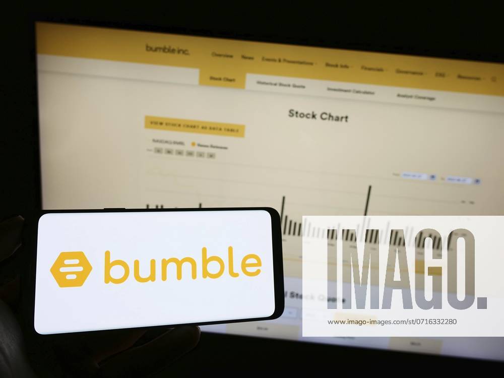 Stuttgart, Germany, 06-28-2023: Person holding mobile phone with logo of American online dating company Bumble Inc. on screen in front of web page. Focus on phone display, Europe