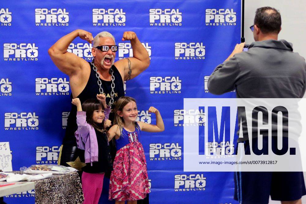 Oceanside, California, USA - 10 15 2016_Oceanside, CA_SoCal Pro Wrestling s Rumble in Oceanside event at the Oceanside Boys & Girls Club gymnasium. Prior to the evening s first bout wrestler Anthony Idol has his photo taken with young fans._Photo by Oceanside USA - ZUMAn47_