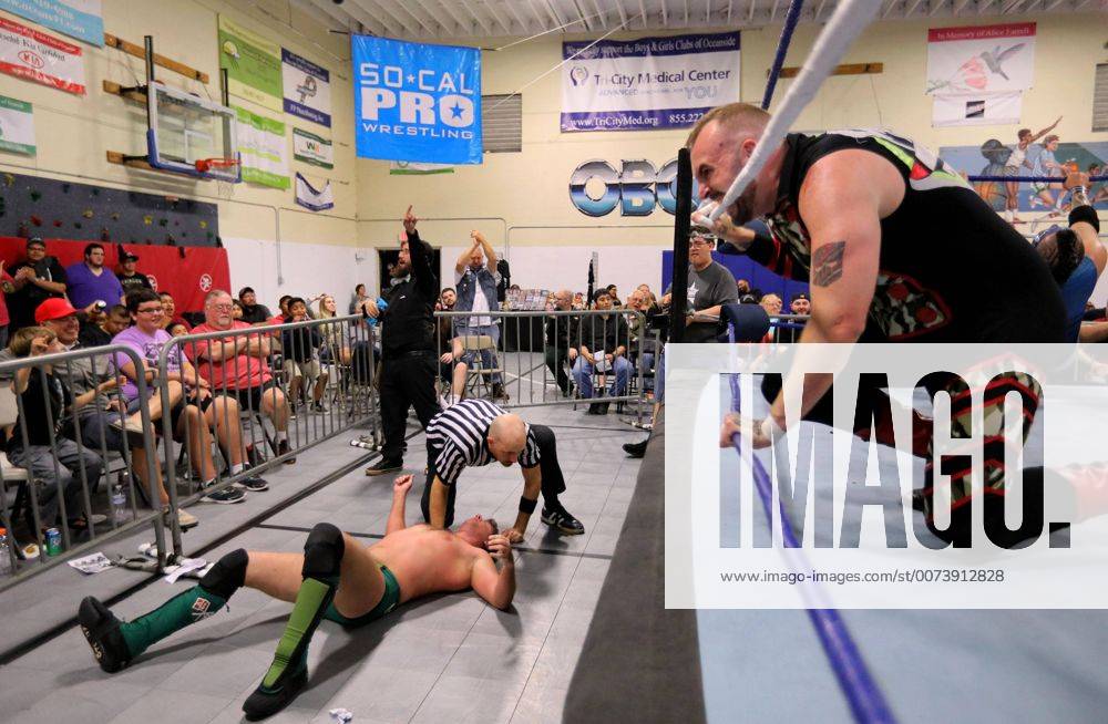 Oceanside, California, USA - 10 15 2016_Oceanside, CA_SoCal Pro Wrestling s Rumble in Oceanside event at the Oceanside Boys & Girls Club gymnasium. Destro bites one of the ropes as he glares at the audience after forcing opponent Todd Chandler from the ring._Photo by Oceanside USA - ZUMAn47_