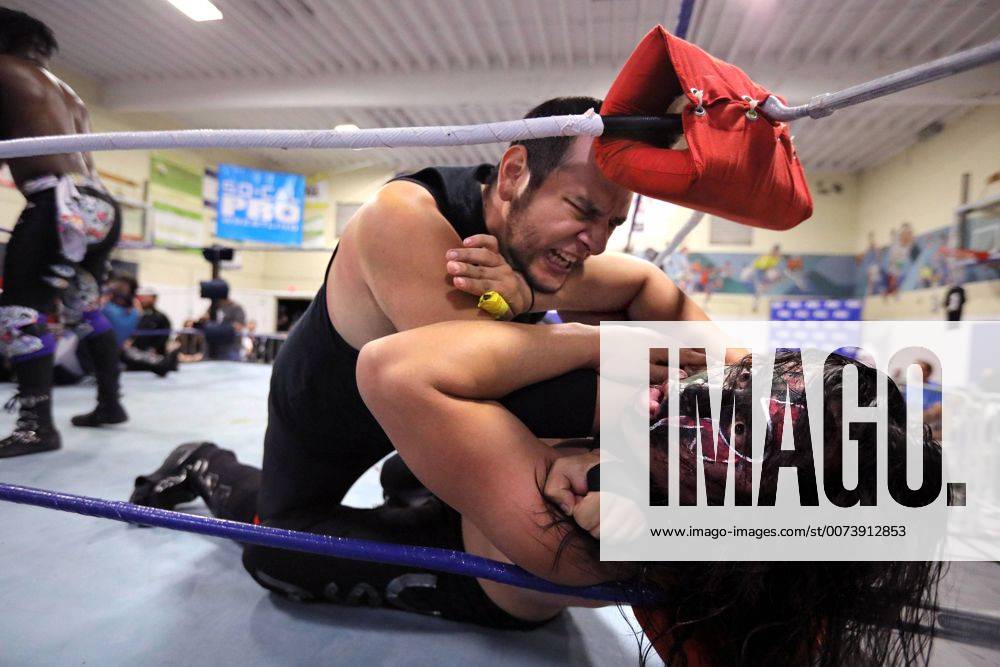 Oceanside, California, USA - 10 15 2016_Oceanside, CA_SoCal Pro Wrestling s Rumble in Oceanside event at the Oceanside Boys & Girls Club gymnasium. Dark Usagi gets choked by an opponent during the evening s main event that included many wrestlers in the ring at the same time._Photo by Oceanside USA - ZUMAn47_