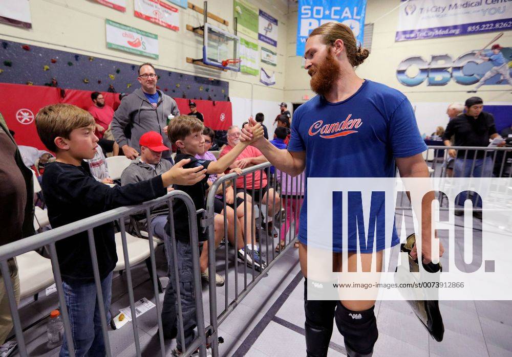Oceanside, California, USA - 10 15 2016_Oceanside, CA_SoCal Pro Wrestling s Rumble in Oceanside event at the Oceanside Boys & Girls Club gymnasium. Wrestler Mike Camden greets young fans before his match._Photo by Oceanside USA - ZUMAn47_