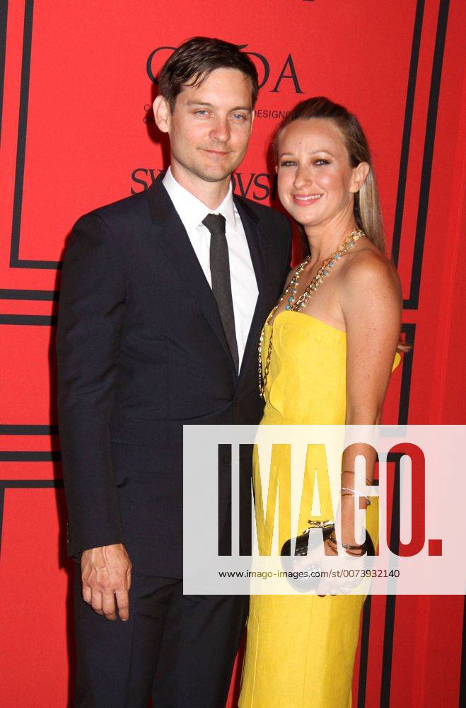 File - TOBEY MAGUIRE and wife jewelry designer, JENNIFER MEYER have mutually decided to call it quits after 9 years of marriage. They have two children: daughter Ruby, 9, and son Otis, 7. Pictured: June 3, 2013 - New York, New York, U.S. - Actor Tobey Maguire And Jennifer Meyer attend the 2013 CFDA Fashion Awards held at Lincoln CenterÃ s Alice Tully Hall. New York U.S. - ZUMAk03_ 20161018_shz_k03_043
