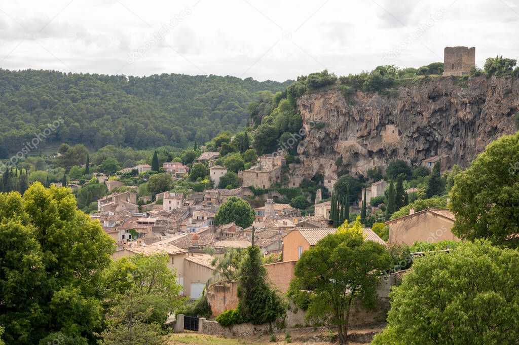 Small old village in hear of Provence Cotignac with famous cliffs with cave dwellings, Var, France