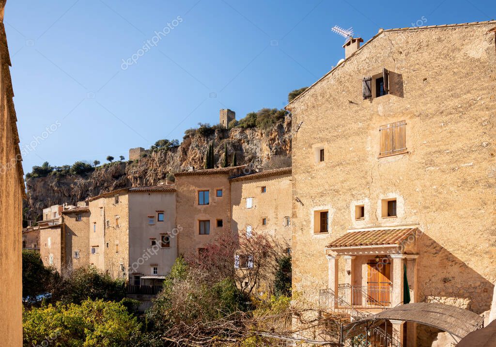 Cotignac is a French village in the Var department of the Provence Alpes Cote d'Azur region. It is famous for its troglodyte dwellings that are carved into tufa cliffs covered with large stalactites, and its two feudal towers from 1033.