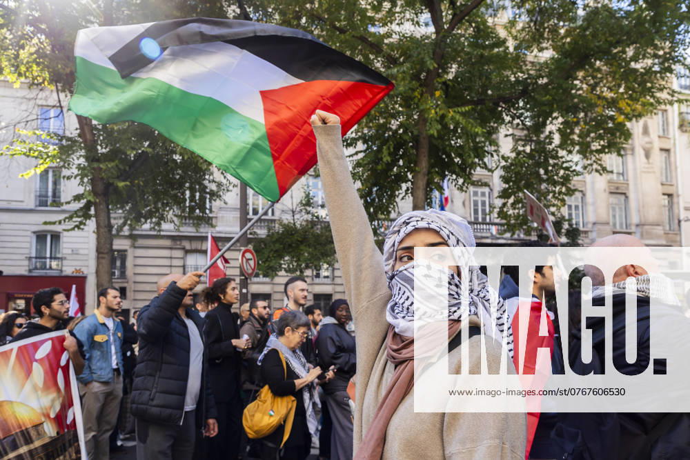 Paris, France October 5, 2024 - Demonstration organized by the Association France Palestine SolidaritÃ (AFPS) to denounce Israel s war in Gaza and Lebanon. Pro-Palestinian demonstrators are participating in national marches across EMEA to mark the start of Israel s war in Gaza after the Hamas attacks of October 7th 2023. They are calling for a ceasefire in the Middle East and an end to the supply of arms to Israel GUERRE, MANIFESTATION PRO PALESTINIENNE, GAZA, PROCHE ORIENT, MOYEN ORIENT, MIDDLE EAST, LIBAN, CONFLIT, GEOPOLITIQUE, ISRAEL, MANIFESTANTS, ARABES, POLITIQUE, GOUVERNEMENT, DIASPORA, MOUVEMENT DE RESISTANCE, TERRITOIRES PALESTINIENS OCCUPES, LUTTE, KEFFIEH, ISLAM, COLERE, FEMMES,