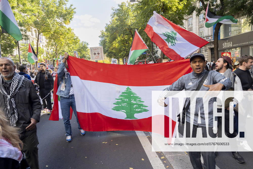 Paris, France October 5, 2024 - Demonstration organized by the Association France Palestine Solidarità (AFPS) to denounce Israel s war in Gaza and Lebanon. Pro-Palestinian demonstrators are participating in national marches across EMEA to mark the start of Israel s war in Gaza after the Hamas attacks of October 7th 2023. They are calling for a ceasefire in the Middle East and an end to the supply of arms to Israel GUERRE, MANIFESTATION PRO PALESTINIENNE, GAZA, PROCHE ORIENT, MOYEN ORIENT, MIDDLE EAST, LIBAN, CONFLIT, GEOPOLITIQUE, ISRAEL, MANIFESTANTS, ARABES, POLITIQUE, GOUVERNEMENT, DIASPORA, MOUVEMENT DE RESISTANCE, TERRITOIRES PALESTINIENS OCCUPES, DRAPEAU LIBANAIS, LIBAN