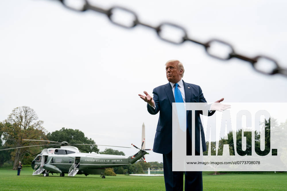 President Donald Trump Speaks to Members of the Media United States President Donald J. Trump speaks to visitors on the South Lawn of the White House before boarding Marine One in Washington, D.C., U.S., on Thursday, September 24, 2020. Credit: Erin Scott Pool via CNP AdMedia Washington District of Columbia United States of America