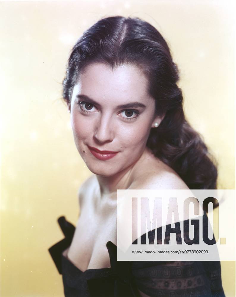 Susan Kohner wearing a Black Gown