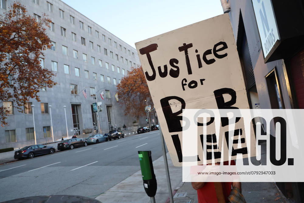 A supporter for a just trial for Murdered tech executive Bob Lee relative, seen holding a sign outside the courthouse during closing arguments of the trial of Nima Momeni is, who is charged with murdering Tech executive Bob Lee in San Francisco, California. Bob Lee, who created the mobile payment service Cash App, was murdered in the cityÃ¢â‚¬â ¢s downtown Rincon Hill neighborhood on April 4, 2023. San Francisco USA - ZUMAm117 20241203_zaf_m117_217