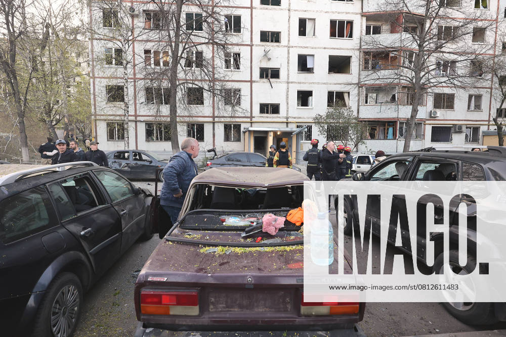 Cars are parked outside an apartment block damaged by a Russian ballistic missile attack in Kharkiv, Ukraine, on April 18, 2025. Russian troops attacked Kharkiv with three ballistic missiles at dawn on Friday, April 18. The missile attack injured 87 people, including six children. Seventeen people were admitted to local hospitals, including a four-year-old girl, a one-year-old boy, and a 14-year-old girl. Currently, three of the injured are in critical condition. One person died. (Photo by Viacheslav Madiievskyi Ukrinform) Russian troops attack Kharkiv with ballistic missiles