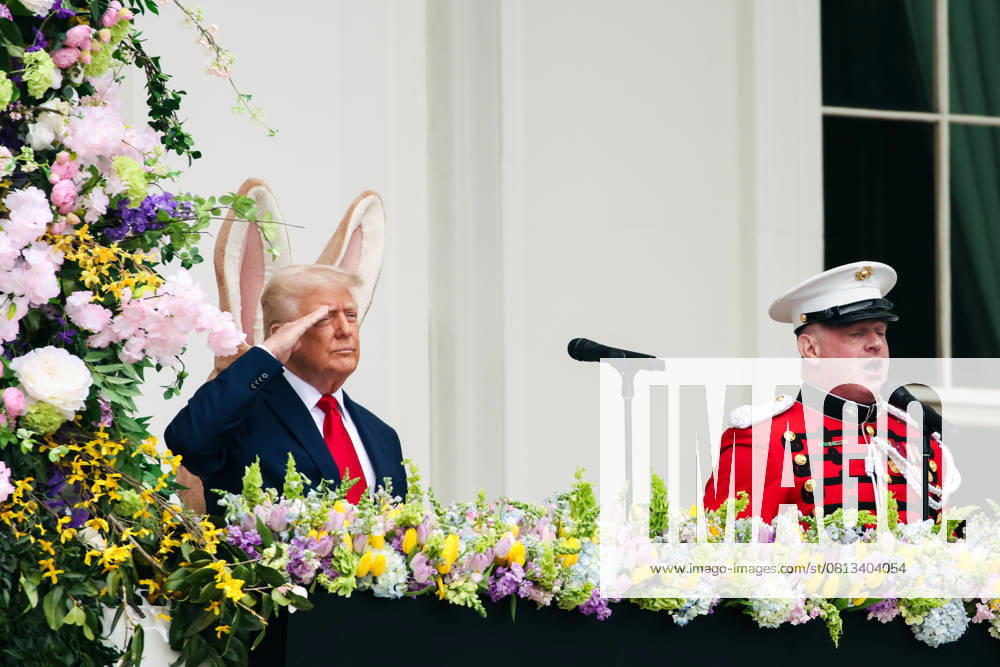 President Donald Trump salutes during the singing of the National Anthem at the 2025 Easter Egg Roll on the South Lawn of the White House in Washington DC on Monday, April 21, 2025 WAX20250421449 SamuelxCorum
