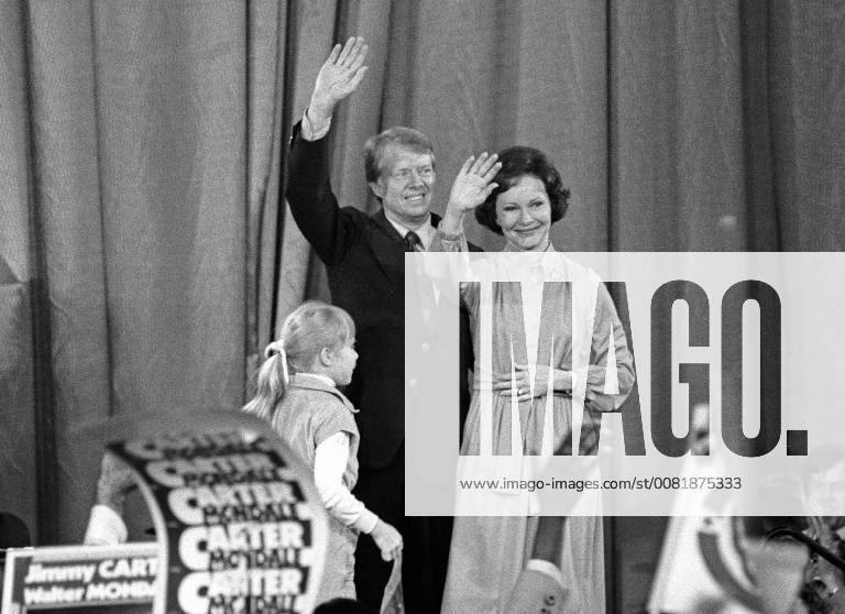 Atlanta, Georgia, Georgia - United States President-elect Jimmy Carter, and his wife, Rosalynn, wave to the crowd at an election night rally as he arrives to claim victory over US President Gerald R. Ford in Atlanta, Georgia on November 3, 1976. .Credit: CNP Atlanta Georgia - ZUMAs152 19761103_zaa_s152_001