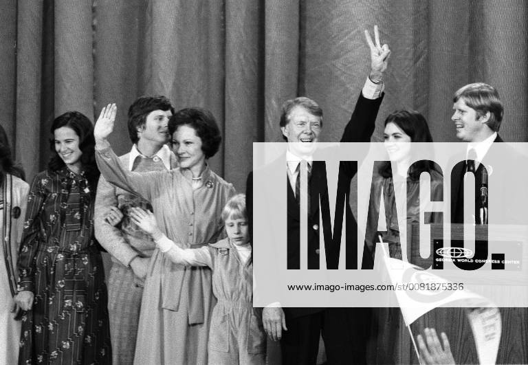 Atlanta, Georgia, Georgia - United States President-elect Jimmy Carter, his wife, Rosalynn, and daughter Amy, surrounded by family, wave to the crowd at an election night rally after he claimed victory over US President Gerald R. Ford in Atlanta, Georgia on November 3, 1976. .Credit: CNP Atlanta Georgia - ZUMAs152 19761103_zaa_s152_004