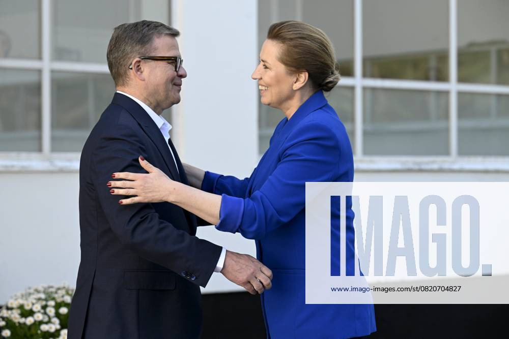 Finnish Prime Minister Petteri Orpo (L) welcomes Danish Prime Minister Mette Frederiksen at the Nordic Prime Ministers Summer Meeting at the Paimio Sanatorium in Paimio, Finland, on May 26, 2025. Finland and Åland together host the informal summer meeting. The discussions of the meeting will focus on two themes: competitiveness and strengthening comprehensive security. Paimio Finland