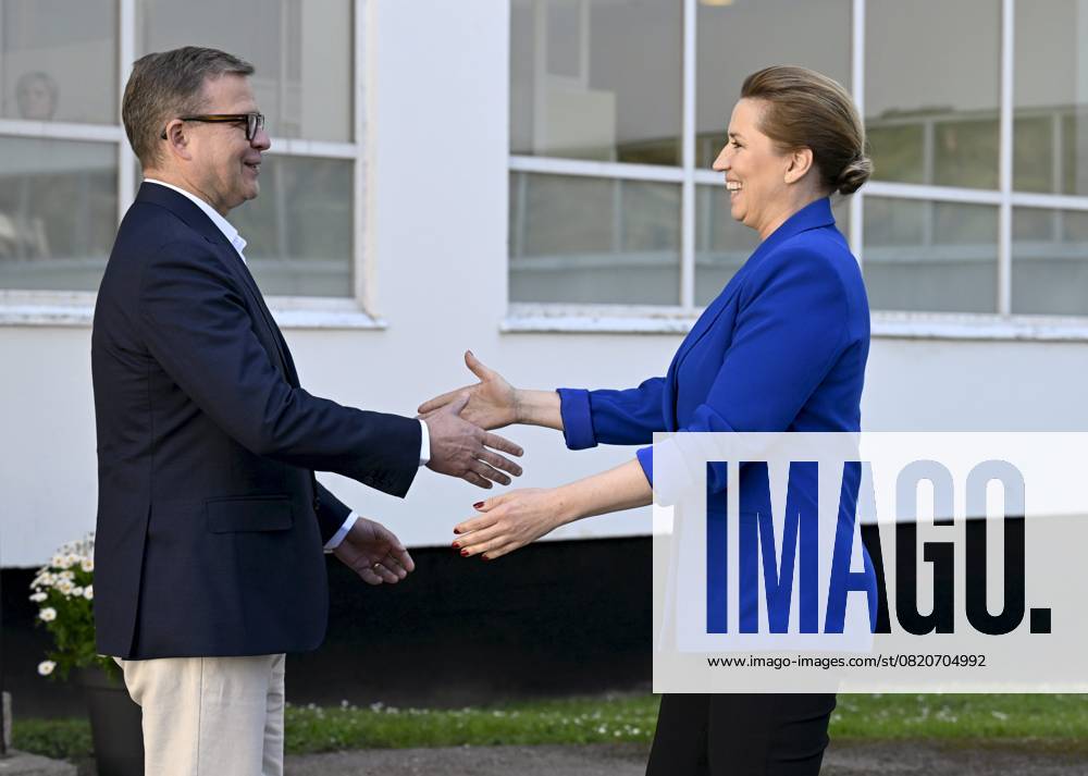 Finnish Prime Minister Petteri Orpo (L) welcomes Danish Prime Minister Mette Frederiksen at the Nordic Prime Ministers Summer Meeting at the Paimio Sanatorium in Paimio, Finland, on May 26, 2025. Finland and Åland together host the informal summer meeting. The discussions of the meeting will focus on two themes: competitiveness and strengthening comprehensive security. Paimio Finland