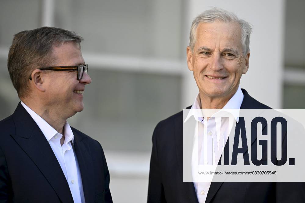 Finnish Prime Minister Petteri Orpo (L) welcomes Norwegian Prime Minister Jonas Gahr Störe at the Nordic Prime Ministers Summer Meeting at the Paimio Sanatorium in Paimio, Finland, on May 26, 2025. Finland and Åland together host the informal summer meeting. The discussions of the meeting will focus on two themes: competitiveness and strengthening comprehensive security. Paimio Finland