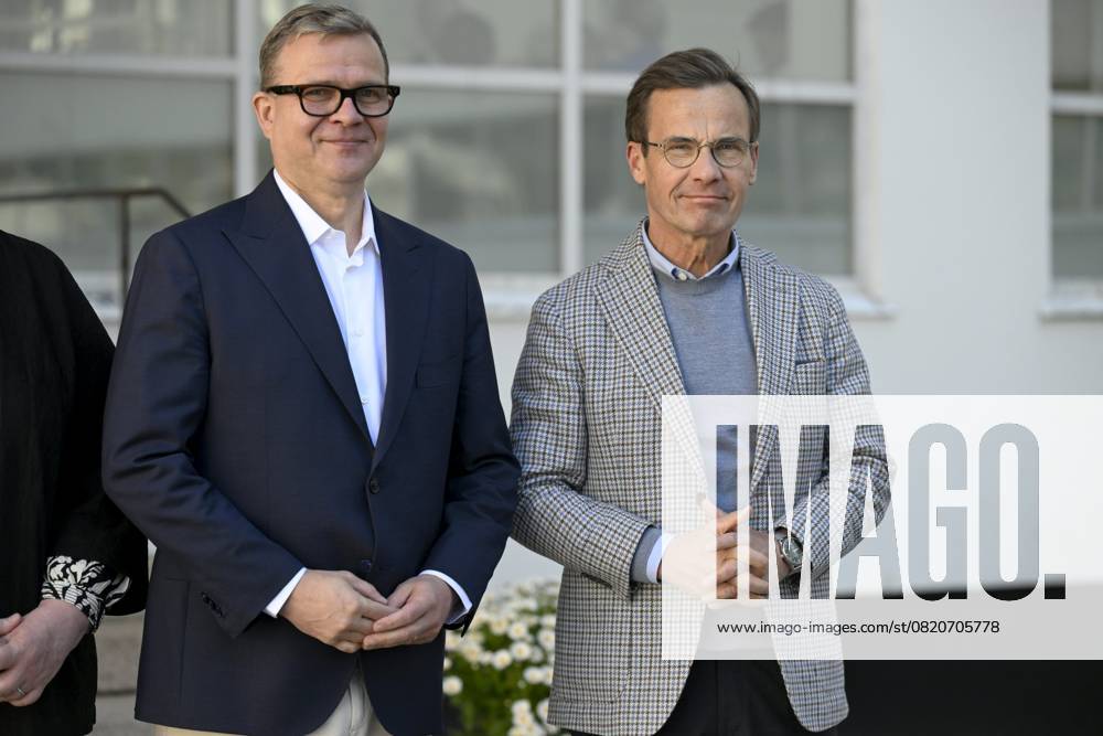 Finnish Prime Minister Petteri Orpo (L) welcomes Swedish Prime Minister Ulf Kristersson at the Nordic Prime Ministers Summer Meeting at the Paimio Sanatorium in Paimio, Finland, on May 26, 2025. Finland and Åland together host the informal summer meeting. The discussions of the meeting will focus on two themes: competitiveness and strengthening comprehensive security. Paimio Finland