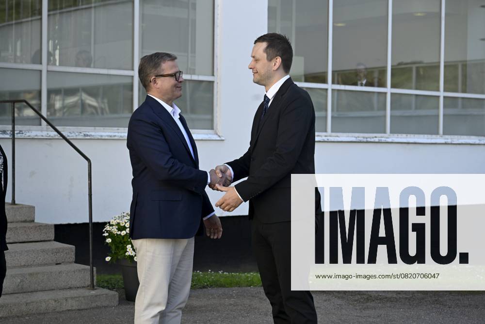 Finnish Prime Minister Petteri Orpo (L) welcomes Greenlandic Prime Minister Jens-Frederik Nielsen at the Nordic Prime Ministers Summer Meeting at the Paimio Sanatorium in Paimio, Finland, on May 26, 2025. Finland and Åland together host the informal summer meeting. The discussions of the meeting will focus on two themes: competitiveness and strengthening comprehensive security. Paimio Finland