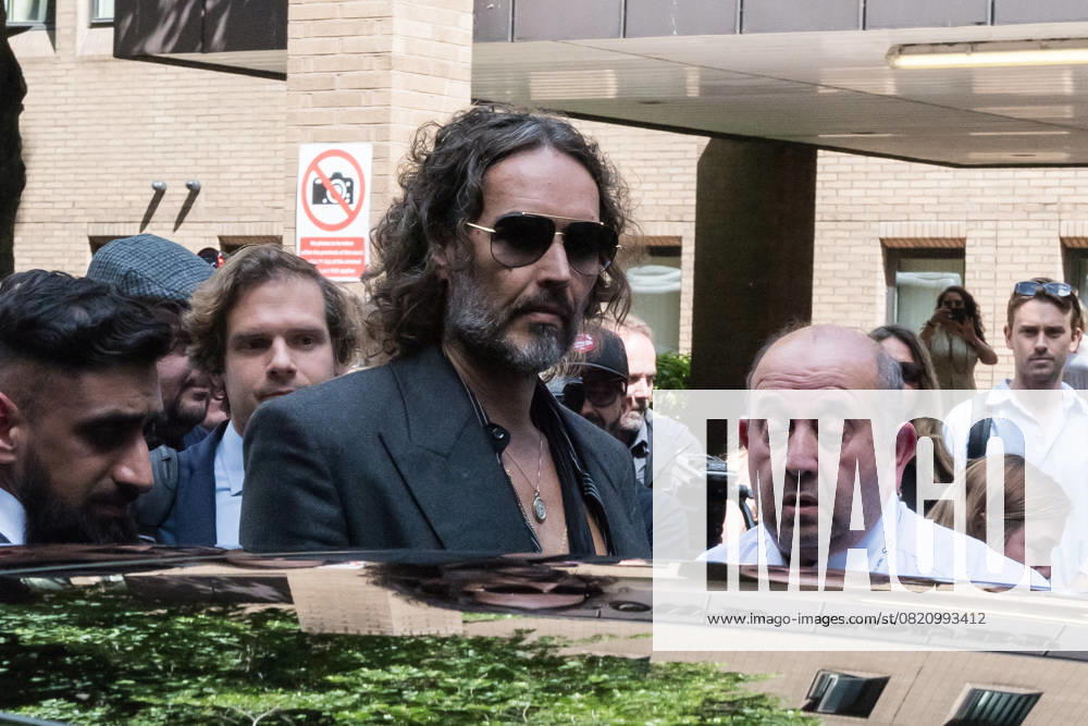 Russell Brand At Southwark Crown Court In London LONDON, UNITED KINGDOM MAY 30, 2025: British actor and comedian Russell Brand leaves Southwark Crown Court followed a plea and trial preparation hearing after being charged with rape, oral rape, indecent assault and two counts of sexual assault, between 1999 and 2005 in Bournemouth and the Westminster area in London, United Kingdom on May 30, 2025. London Greater London United Kingdom