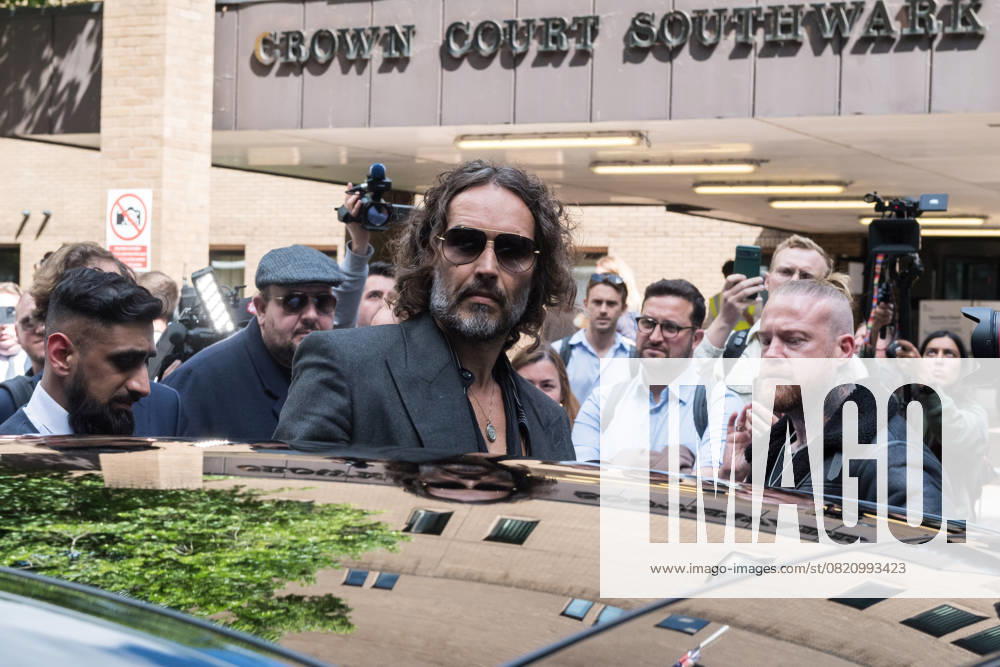 Russell Brand At Southwark Crown Court In London LONDON, UNITED KINGDOM MAY 30, 2025: British actor and comedian Russell Brand leaves Southwark Crown Court followed a plea and trial preparation hearing after being charged with rape, oral rape, indecent assault and two counts of sexual assault, between 1999 and 2005 in Bournemouth and the Westminster area in London, United Kingdom on May 30, 2025. London Greater London United Kingdom