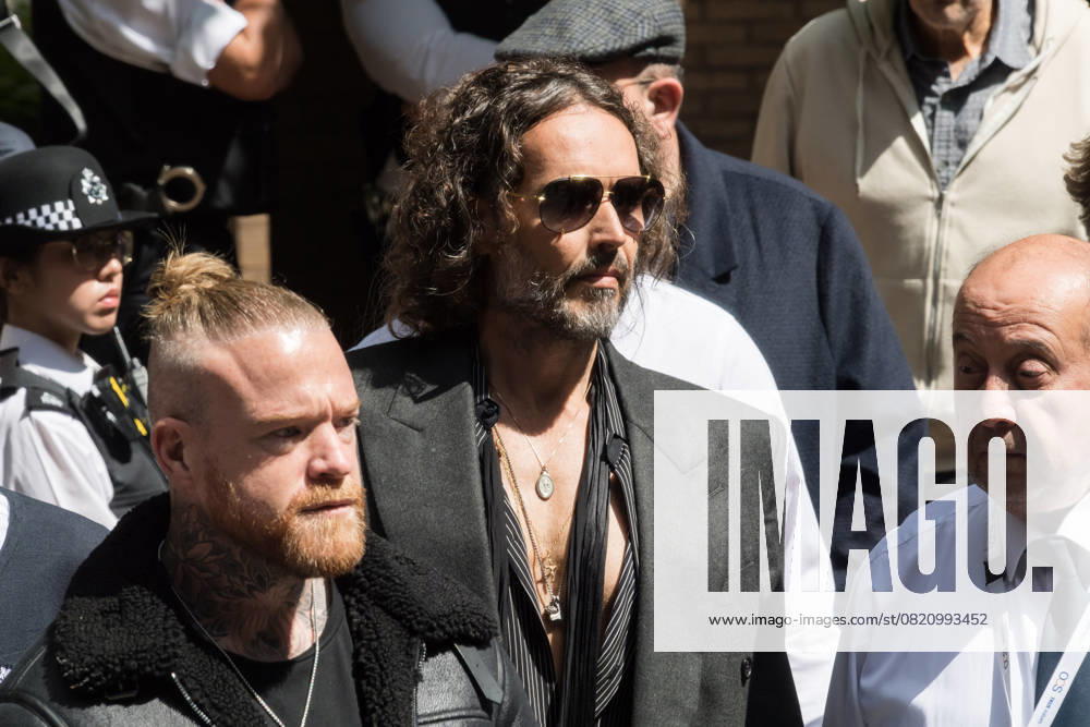 Russell Brand At Southwark Crown Court In London LONDON, UNITED KINGDOM MAY 30, 2025: British actor and comedian Russell Brand leaves Southwark Crown Court followed a plea and trial preparation hearing after being charged with rape, oral rape, indecent assault and two counts of sexual assault, between 1999 and 2005 in Bournemouth and the Westminster area in London, United Kingdom on May 30, 2025. London Greater London United Kingdom