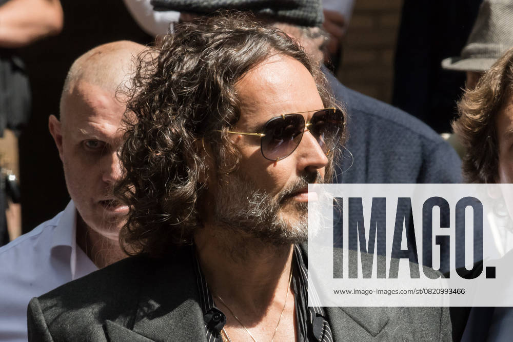 Russell Brand At Southwark Crown Court In London LONDON, UNITED KINGDOM MAY 30, 2025: British actor and comedian Russell Brand leaves Southwark Crown Court followed a plea and trial preparation hearing after being charged with rape, oral rape, indecent assault and two counts of sexual assault, between 1999 and 2005 in Bournemouth and the Westminster area in London, United Kingdom on May 30, 2025. London Greater London United Kingdom