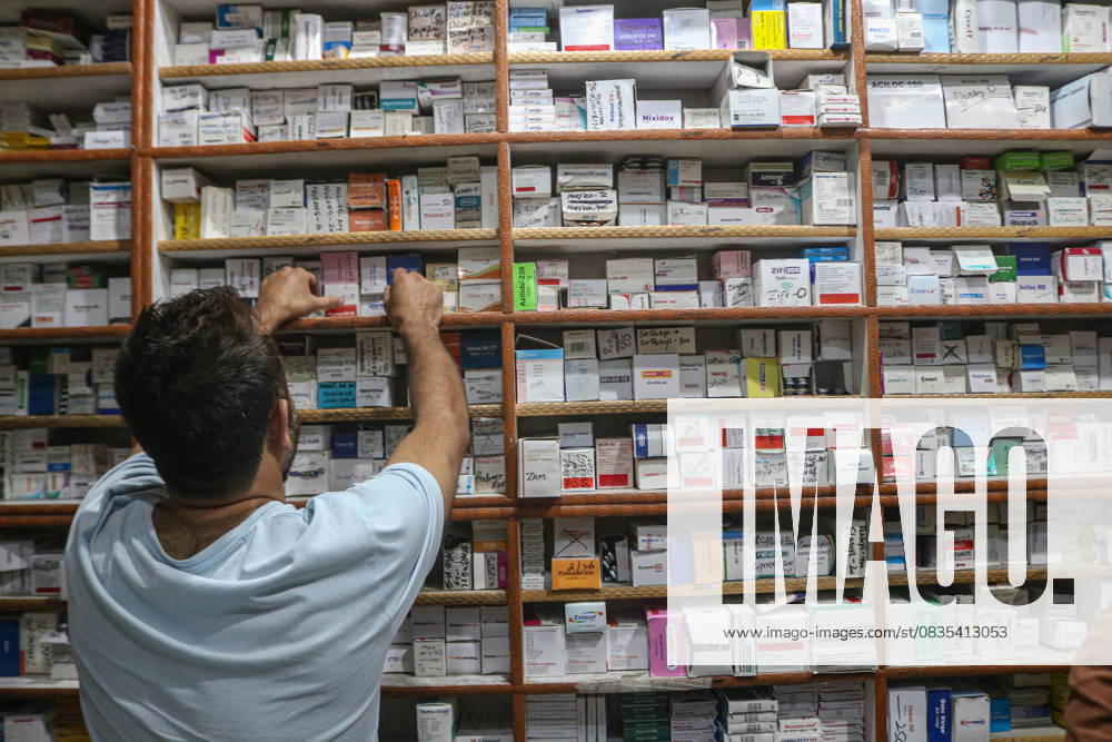US President Donald Trump Slaps 100% Tariff On Branded Pharma Drug Imports An employee checks the stock of medicines at a pharmacy in Srinagar, Jammu and Kashmir, on September 26, 2025. US President Donald Trump says on Thursday that the United States imposes a 100% tariff on imports of branded or patented pharmaceutical products from October 1, unless a given pharmaceutical company is building a manufacturing plant in the U.S. SRINAGAR, Jammu And Kashmir India