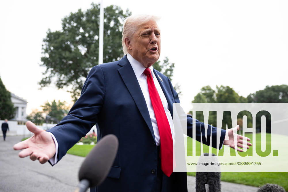 President Donald Trump speaks with reporters as he walks on the South Lawn of the White House on his way to board Marine One on Tuesday, September 30, 2025. He is on his way to Quantico to meet with military officers. WASP2025093005 FrancisxChung