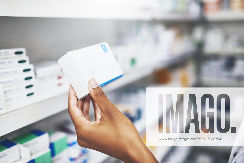 Pharmacist, hands and medicine box in clinic for prescription, information and medical product of wellness. Person, pills and retail shopping, pharmaceutical care and inventory management at pharmacy Pharmacist, hands and medicine box in clinic for prescription, information and medical product of wellness. Person, pills and retail shopping, pharmaceutical care and inventory management at pharmacy., model released, , property released, , 60957790.jpg RECORD DATE NOT STATED
